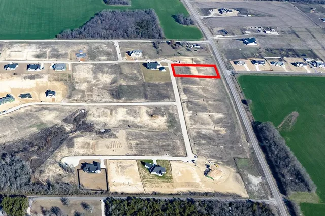 a view of swimming pool with a yard