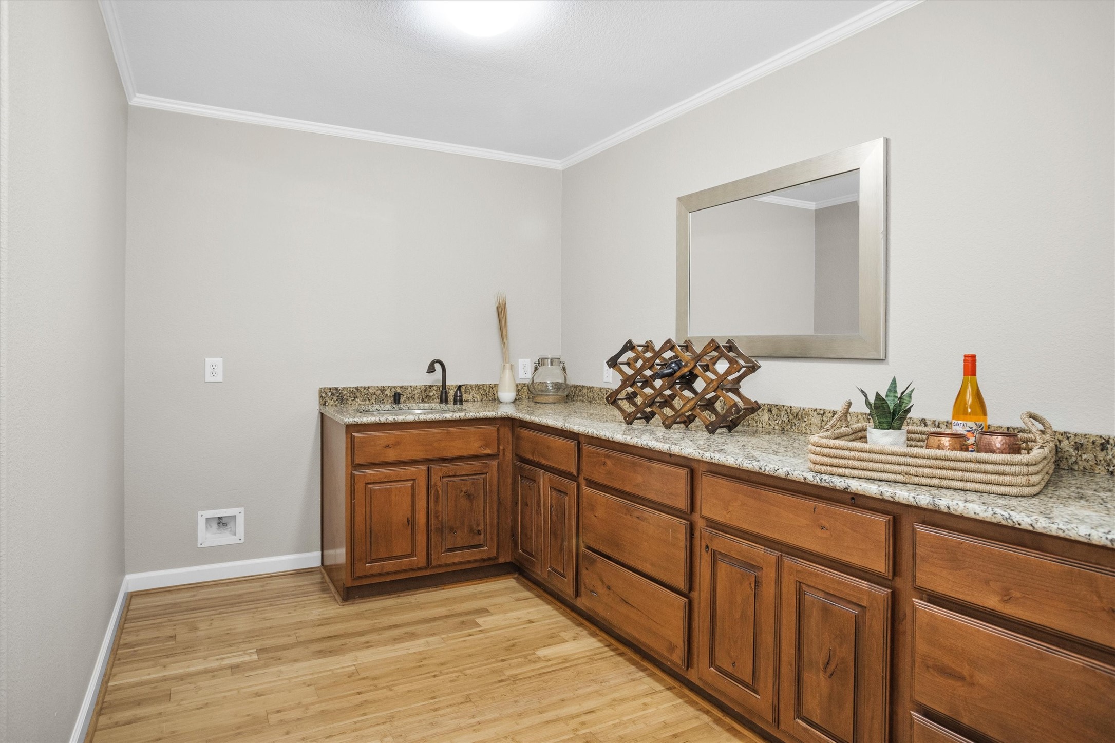 27910 Hansons Court Spring, TX 77386 - Photo 33 of 50 The upstairs kitchenette/wet bar with granite counters, ample storage and counter space, solid-wood cabinetry, space for a full-size fridge