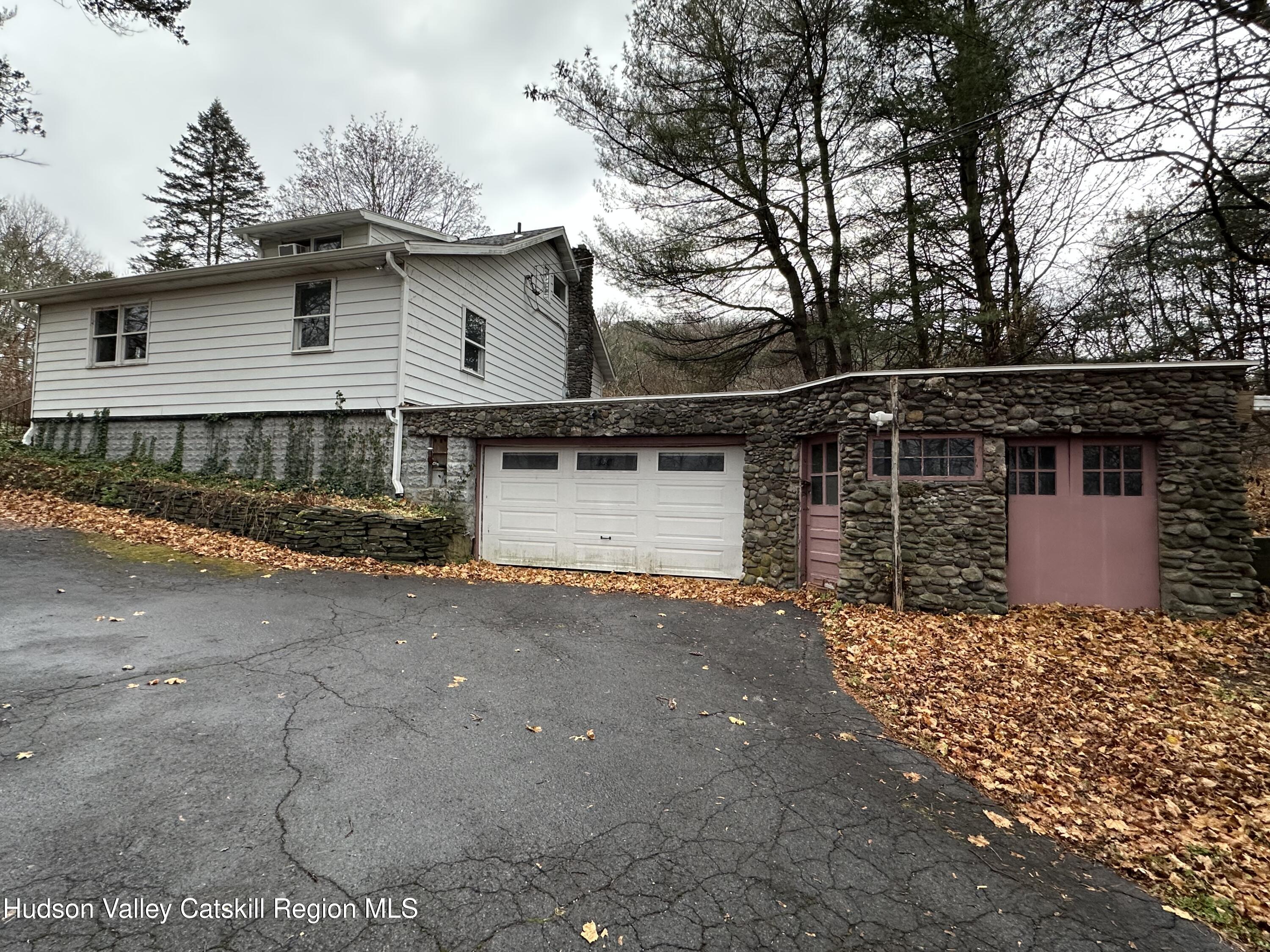 197 Old Rte 32 Saugerties, NY 12477 - Photo 2 of 31 a front view of a house with garden