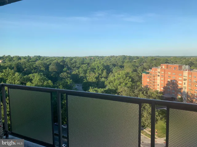 a view of a balcony with an outdoor space