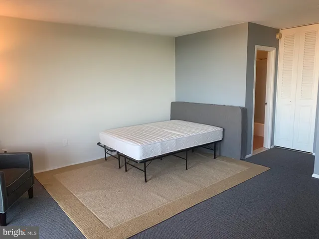 a room with a table and a window