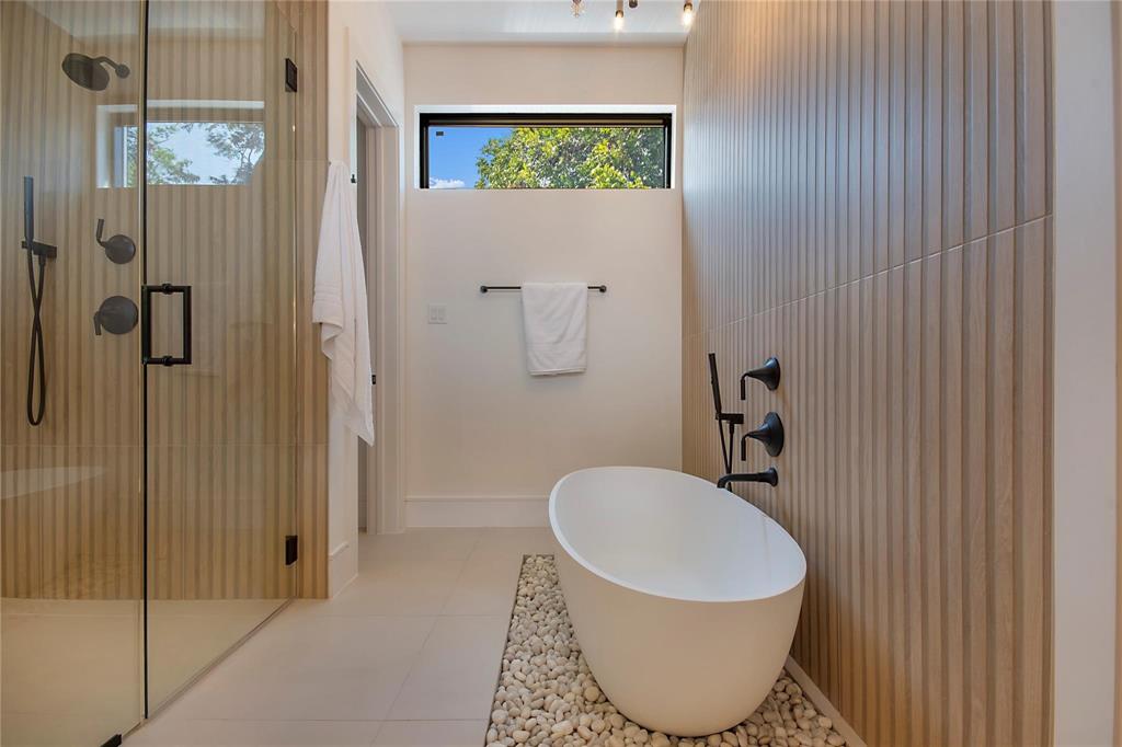 7619 Kenwell Street Dallas, TX 75209 - Photo 23 of 40 a bathroom with a toilet sink and shower