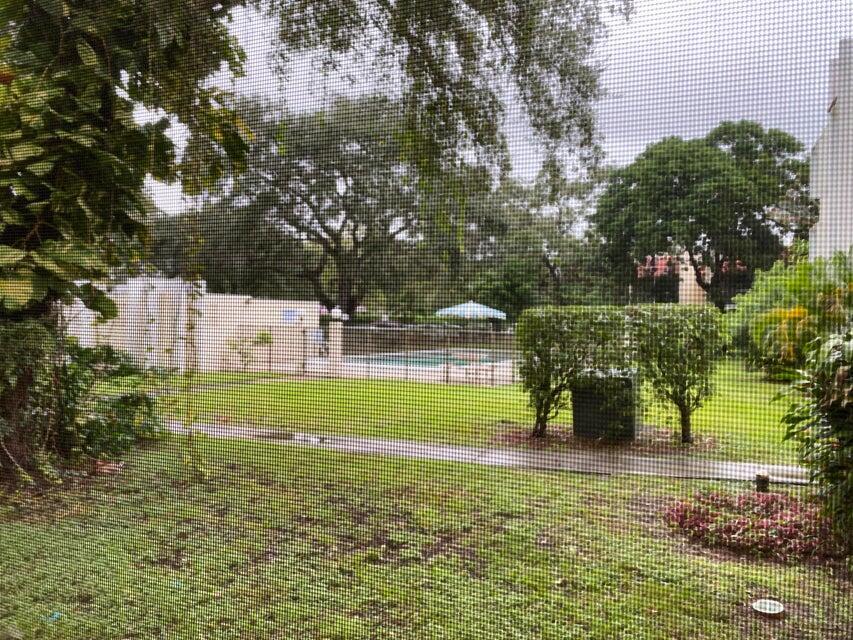 626 Northwest 13th Street, Unit 16 Boca Raton, FL 33486 - Photo 10 of 10 a view of a park with large trees