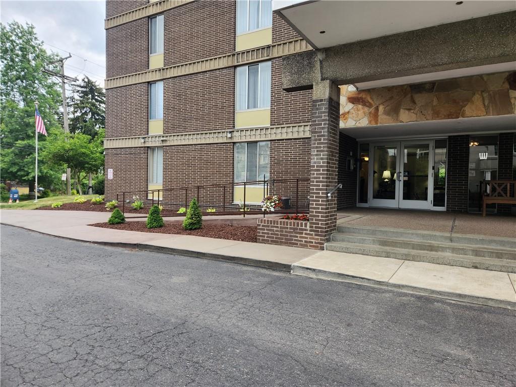 301 South Home Avenue, Unit 411 Pittsburgh, PA 15202 - Photo 19 of 20 a view of a building with a street