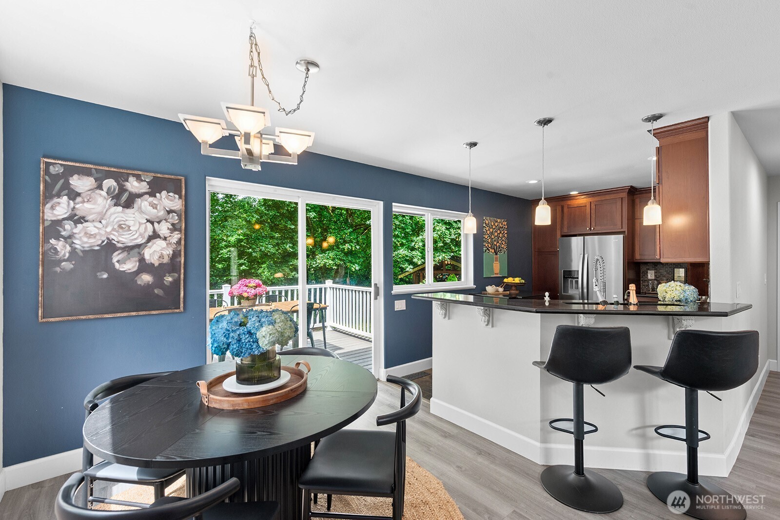 23835 Dockton Road Southwest Vashon, WA 98070 - Photo 14 of 38 a kitchen with a dining table and chairs