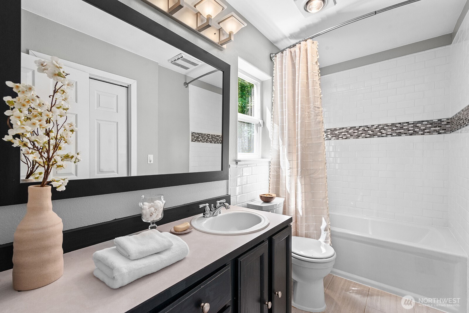 23835 Dockton Road Southwest Vashon, WA 98070 - Photo 19 of 38 a bathroom with a sink vanity mirror and toilet