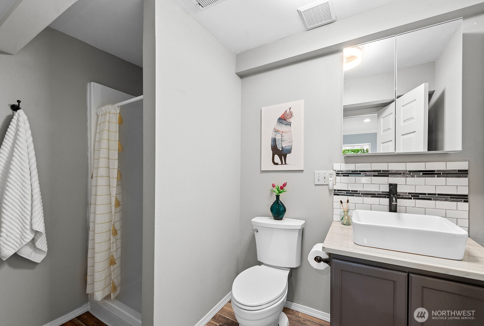 23835 Dockton Road Southwest Vashon, WA 98070 - Photo 20 of 38 a bathroom with a sink toilet and mirror