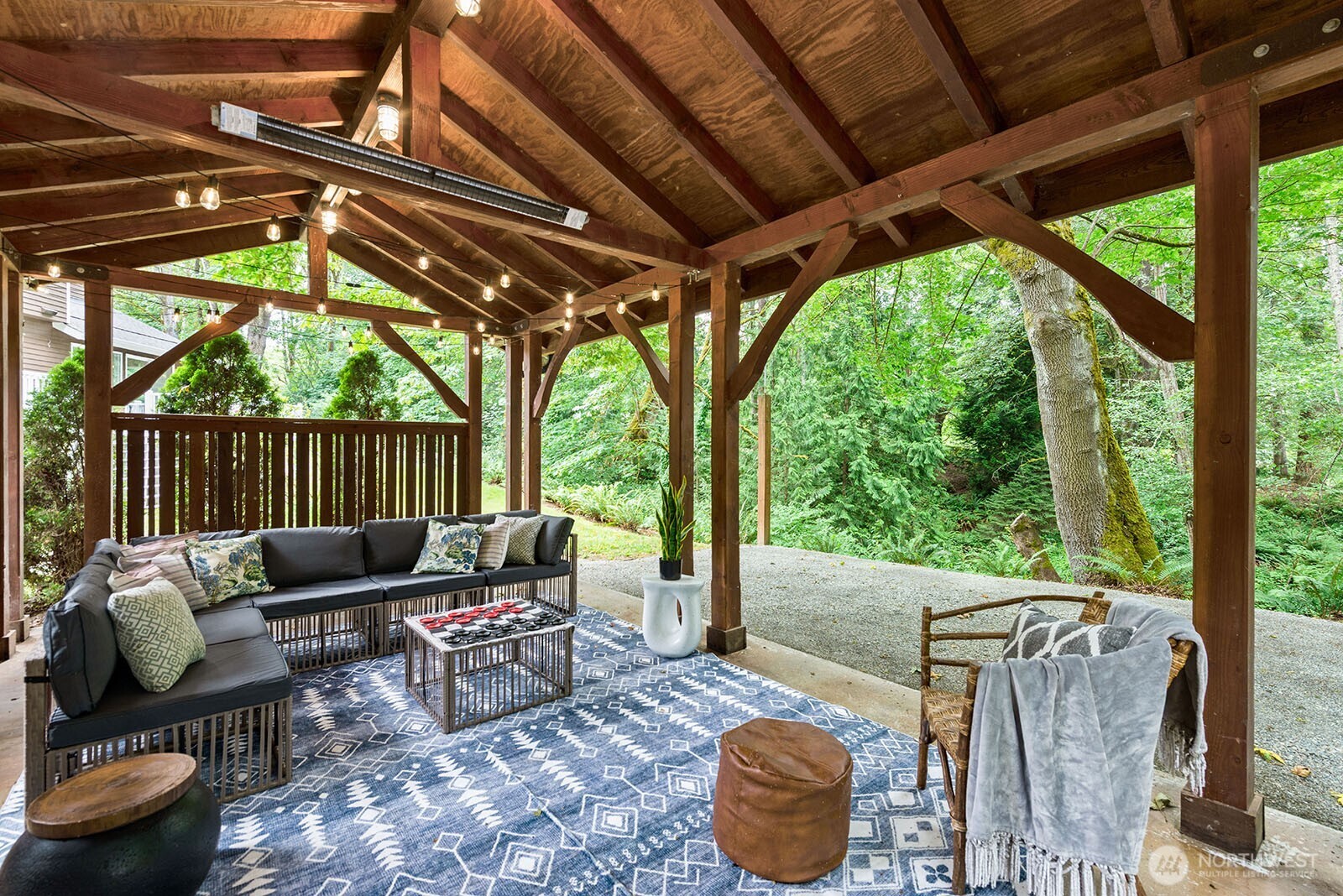 23835 Dockton Road Southwest Vashon, WA 98070 - Photo 25 of 38 a patio with patio couch and chairs