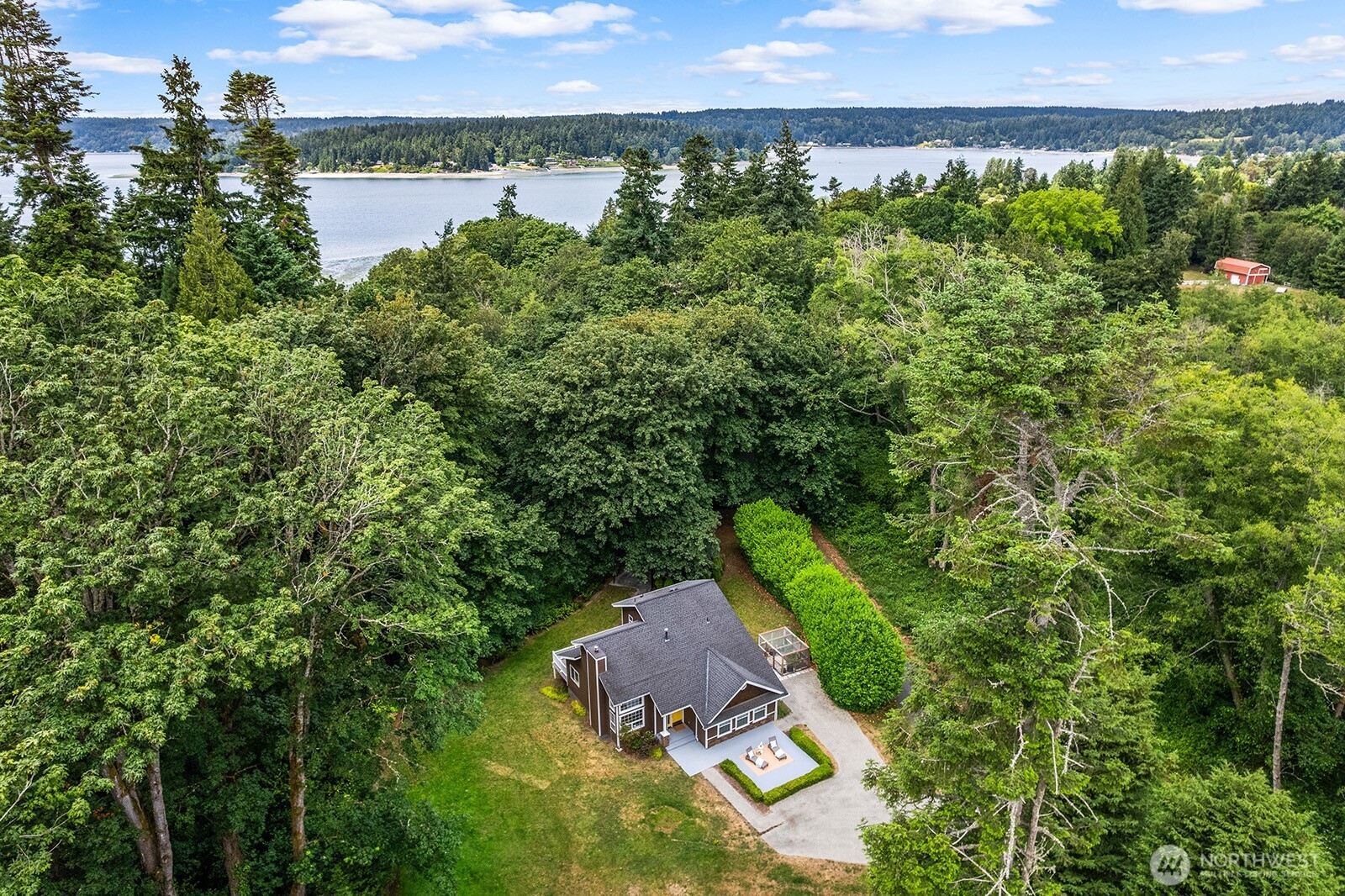 23835 Dockton Road Southwest Vashon, WA 98070 - Photo 27 of 38 an aerial view of a house with a yard and lake view