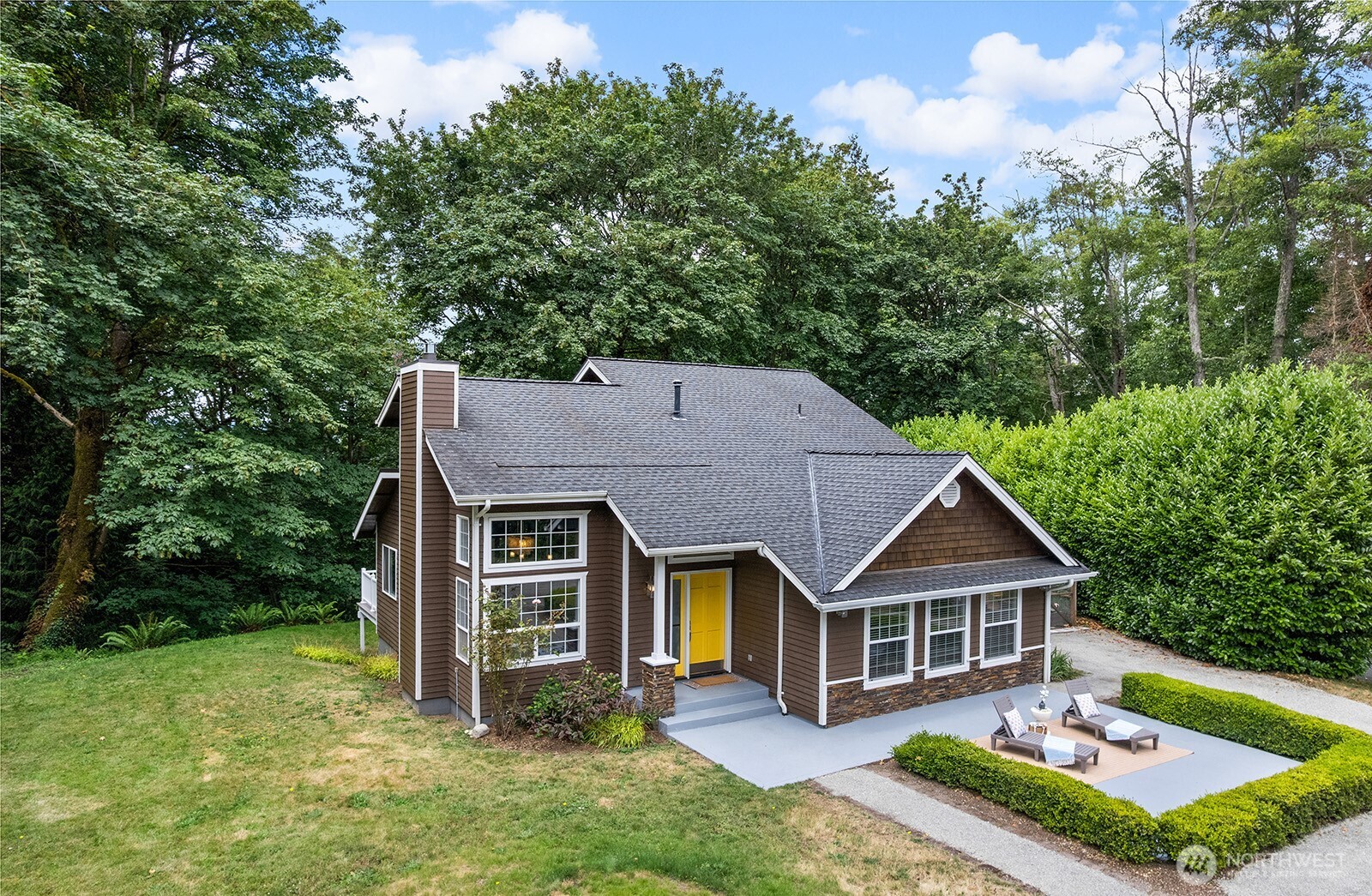 23835 Dockton Road Southwest Vashon, WA 98070 - Photo 29 of 38 a front view of a house with garden