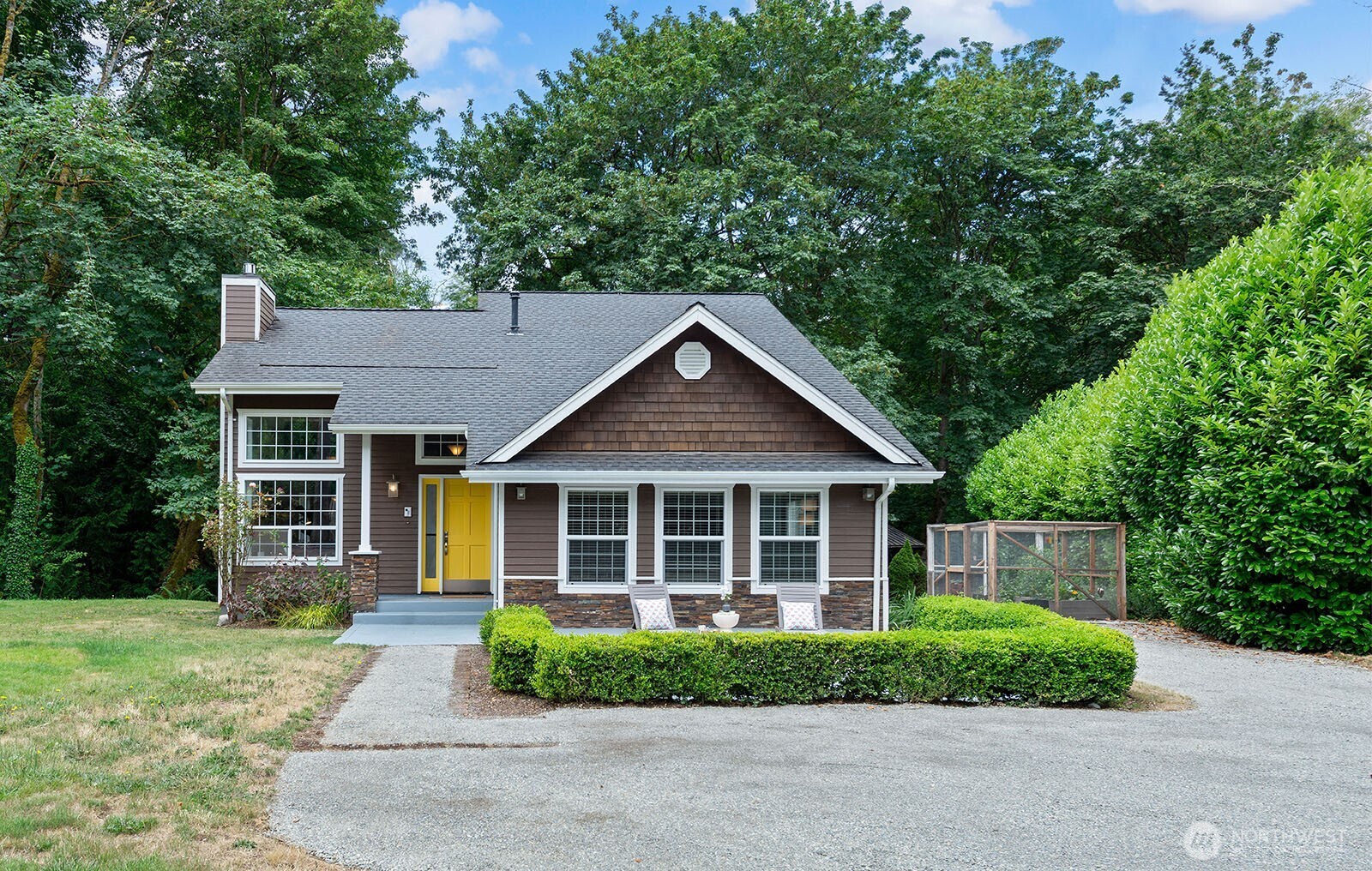 23835 Dockton Road Southwest Vashon, WA 98070 - Photo 30 of 38 front view of a house with a yard