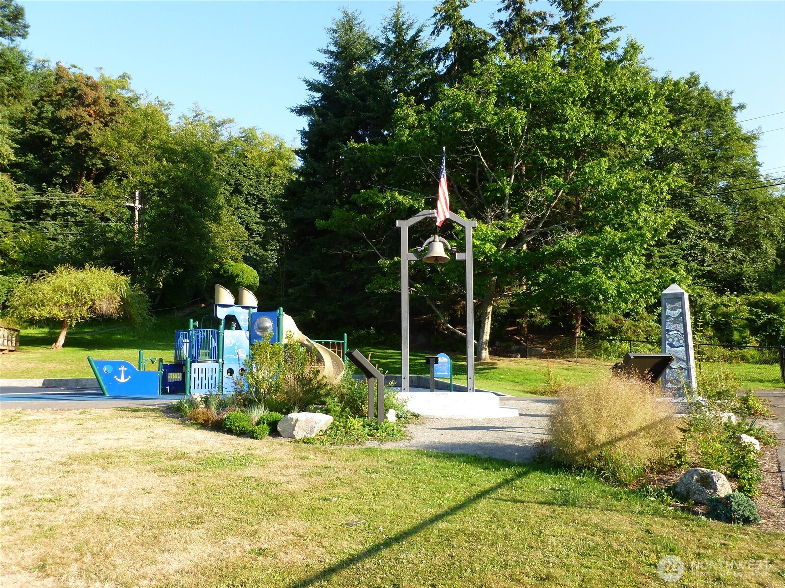 23835 Dockton Road Southwest Vashon, WA 98070 - Photo 35 of 38 a view of a backyard with swimming pool