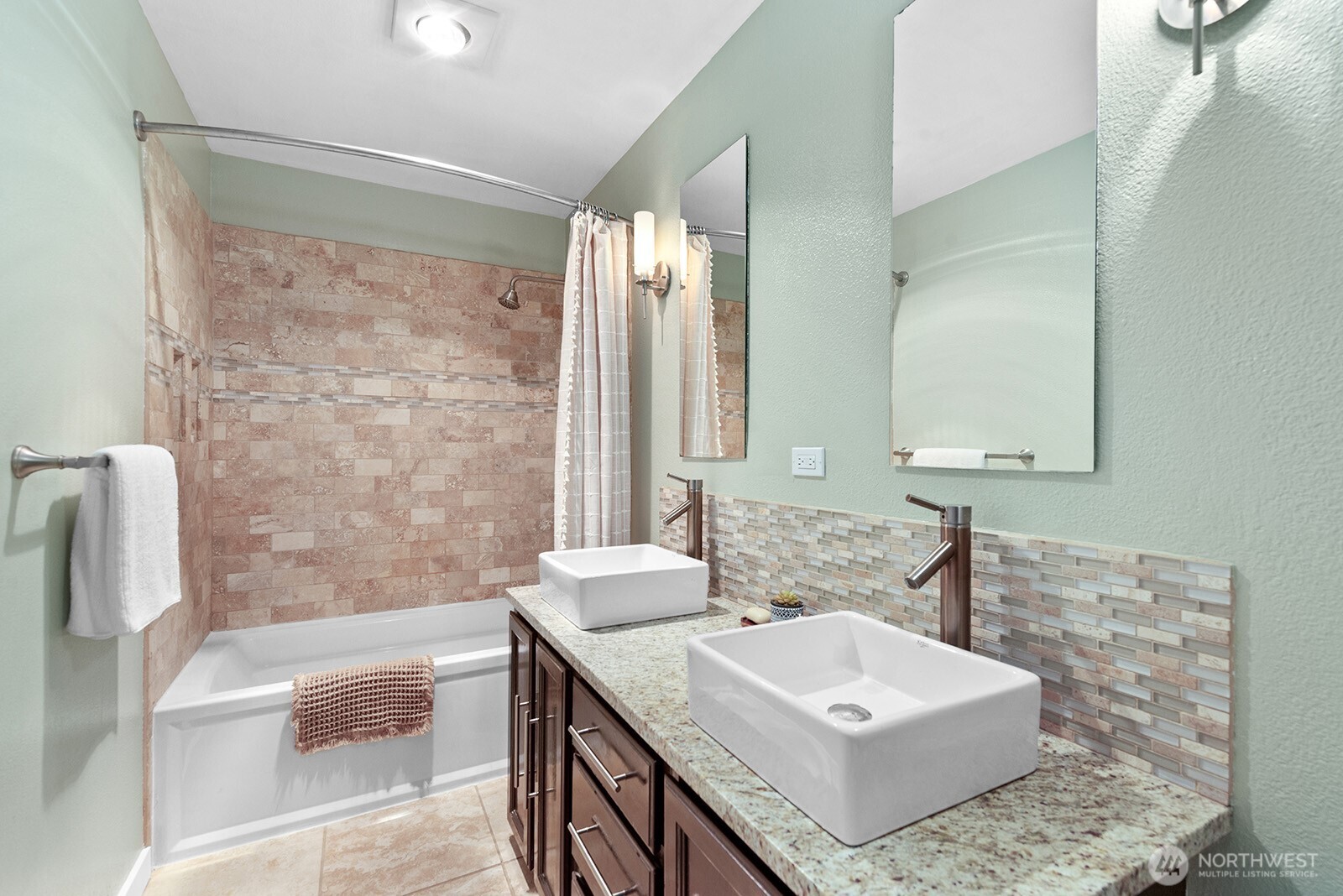 23835 Dockton Road Southwest Vashon, WA 98070 - Photo 10 of 38 a bathroom with a sink double vanity mirror and a bathtub