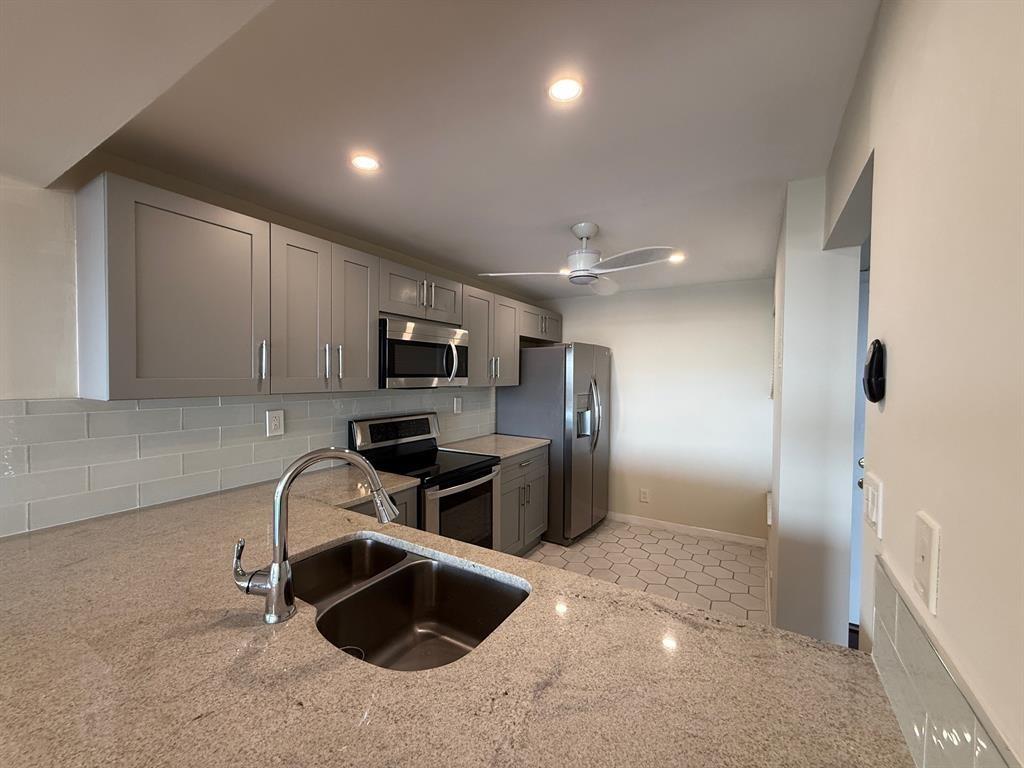 9 Royal Palm Way Boca Raton, FL 33432 - Photo 2 of 10 a view of a workspace with furniture