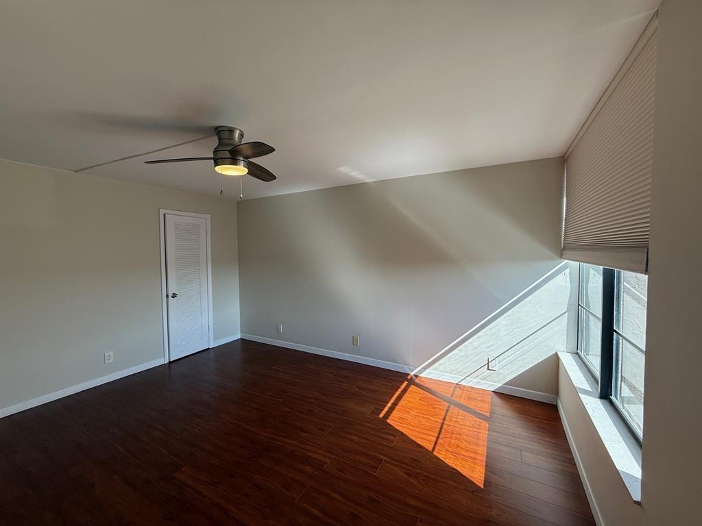 9 Royal Palm Way Boca Raton, FL 33432 - Photo 7 of 10 a view of an empty room with wooden floor
