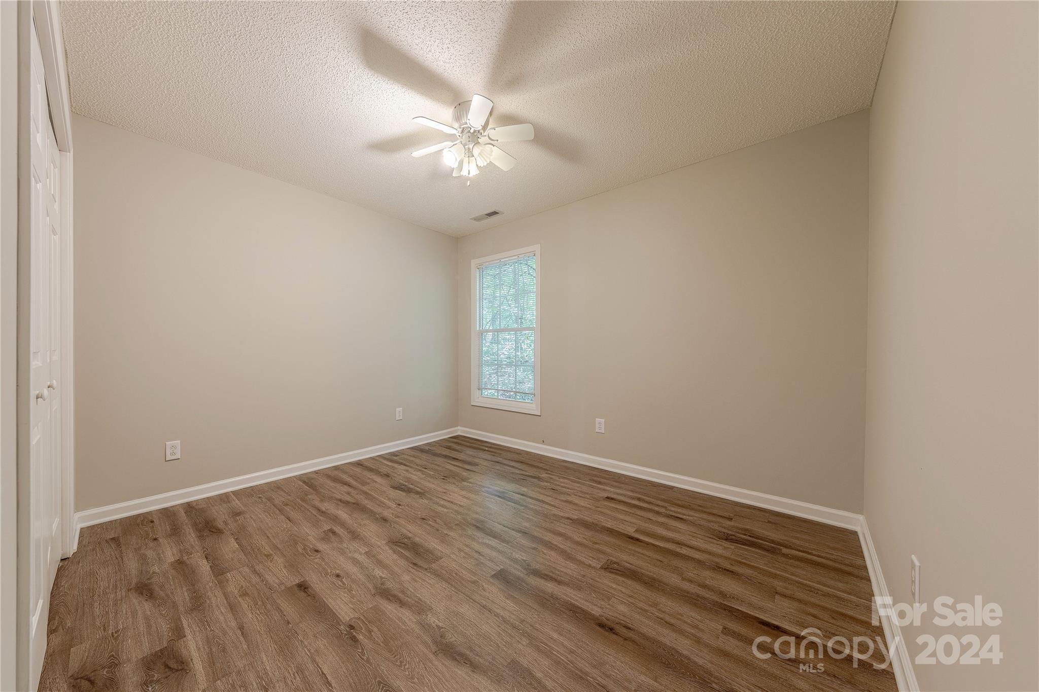 3230 McLendon Road Matthews, NC 28104 - Photo 21 of 29 wooden floor in an empty room