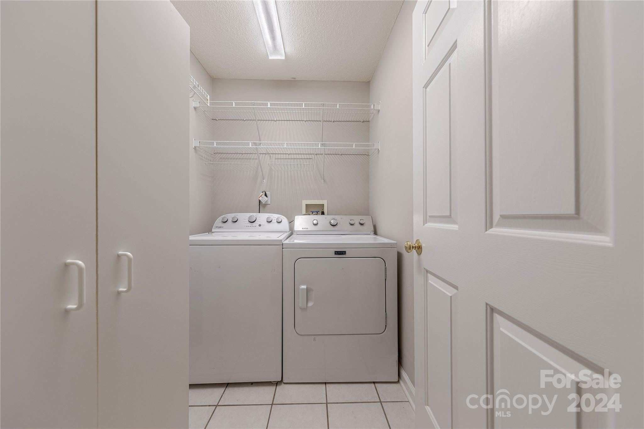 3230 McLendon Road Matthews, NC 28104 - Photo 24 of 29 a utility room with dryer and washer