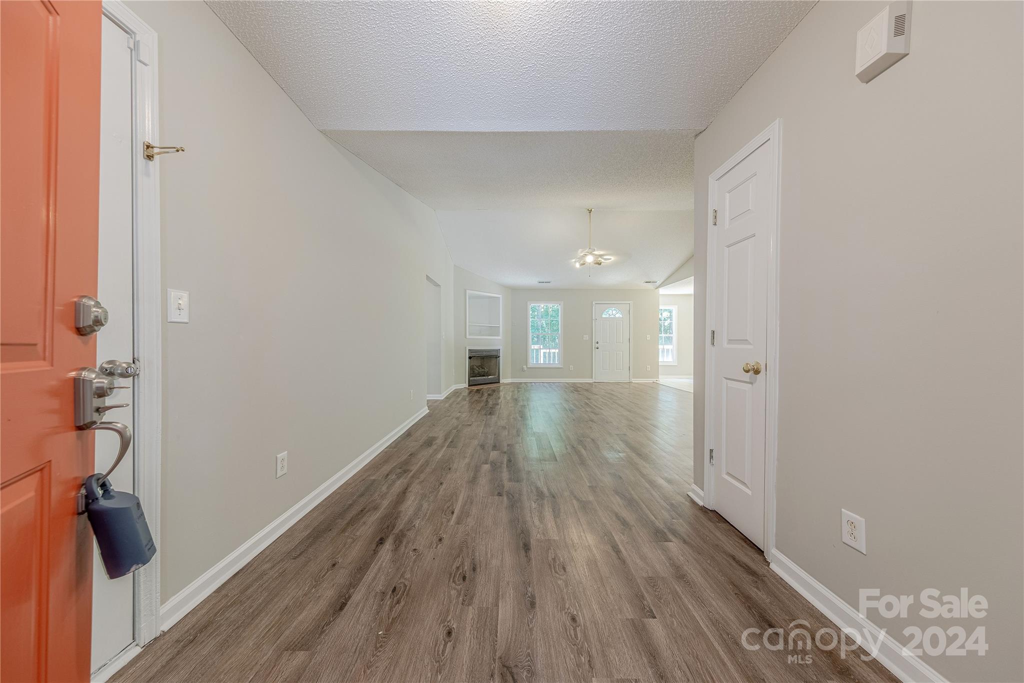 3230 McLendon Road Matthews, NC 28104 - Photo 3 of 29 a view of hallway with wooden floor