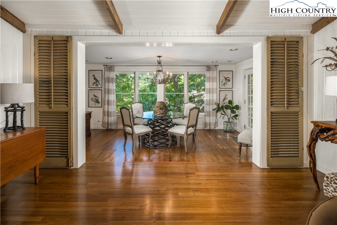 271 Pinnacle Avenue Blowing Rock, NC 28605 - Photo 11 of 43 a view of a dining room with furniture window and wooden floor