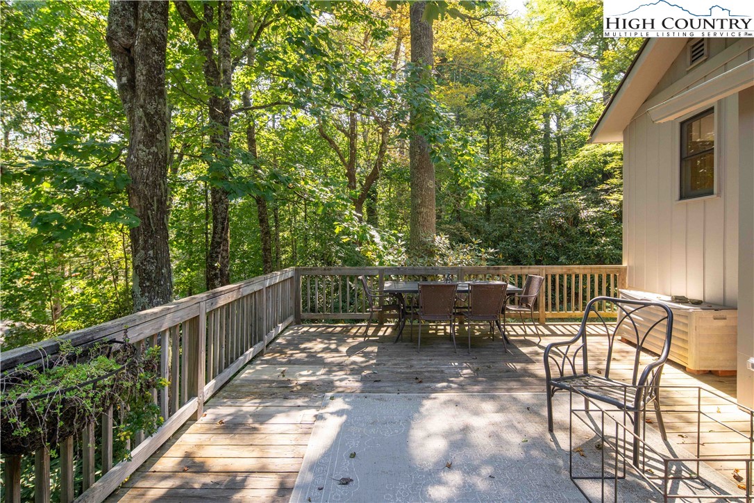 271 Pinnacle Avenue Blowing Rock, NC 28605 - Photo 15 of 43 a view of two chairs and table in the balcony