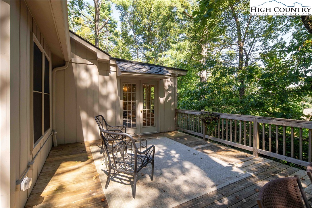 271 Pinnacle Avenue Blowing Rock, NC 28605 - Photo 16 of 43 a view of a chair and table in the balcony