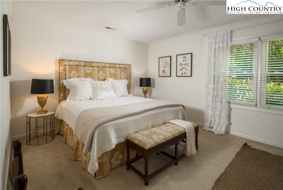 271 Pinnacle Avenue Blowing Rock, NC 28605 - Photo 20 of 43 a bedroom with a bed and window