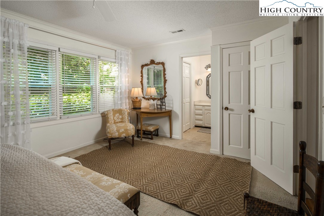 271 Pinnacle Avenue Blowing Rock, NC 28605 - Photo 22 of 43 a living room with furniture and a window