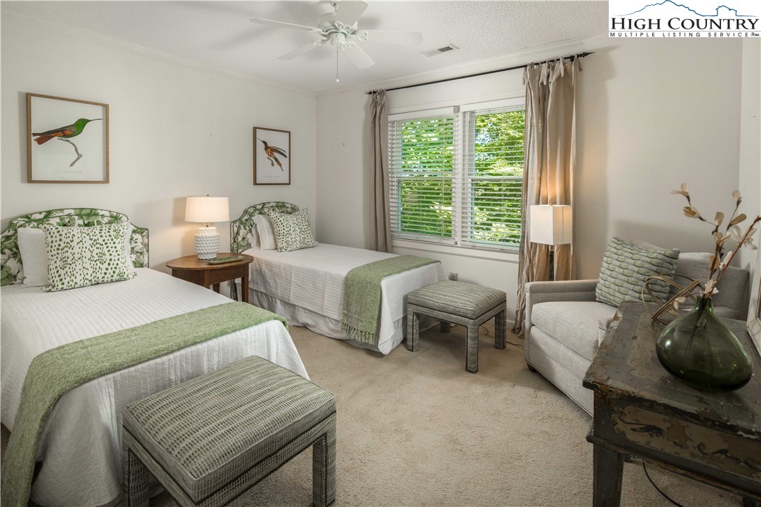271 Pinnacle Avenue Blowing Rock, NC 28605 - Photo 24 of 43 a bedroom with two beds and a large window