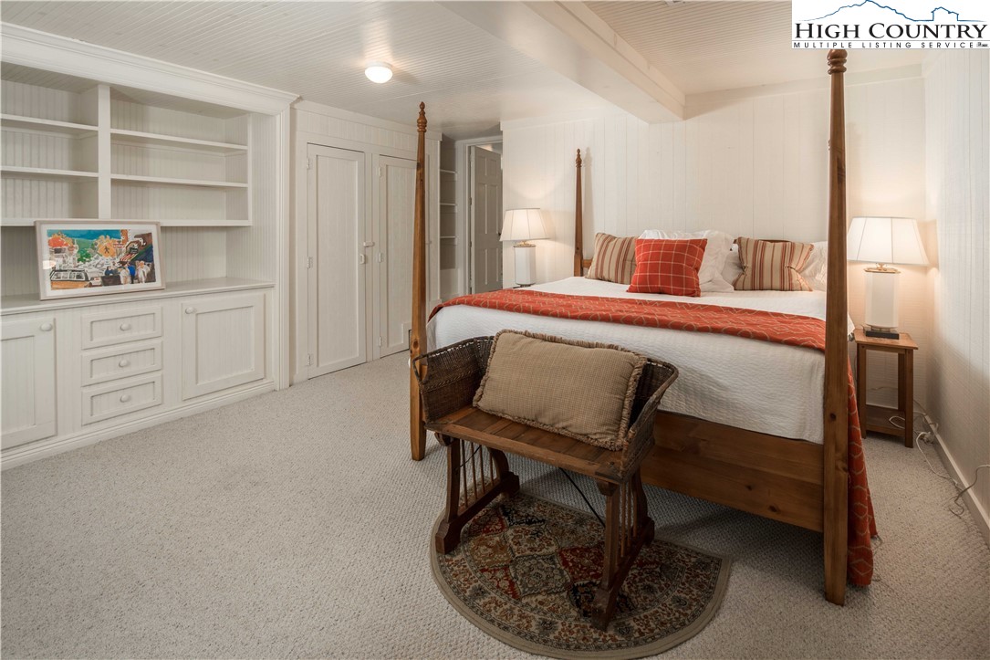 271 Pinnacle Avenue Blowing Rock, NC 28605 - Photo 30 of 43 a bedroom with a bed and a cabinets