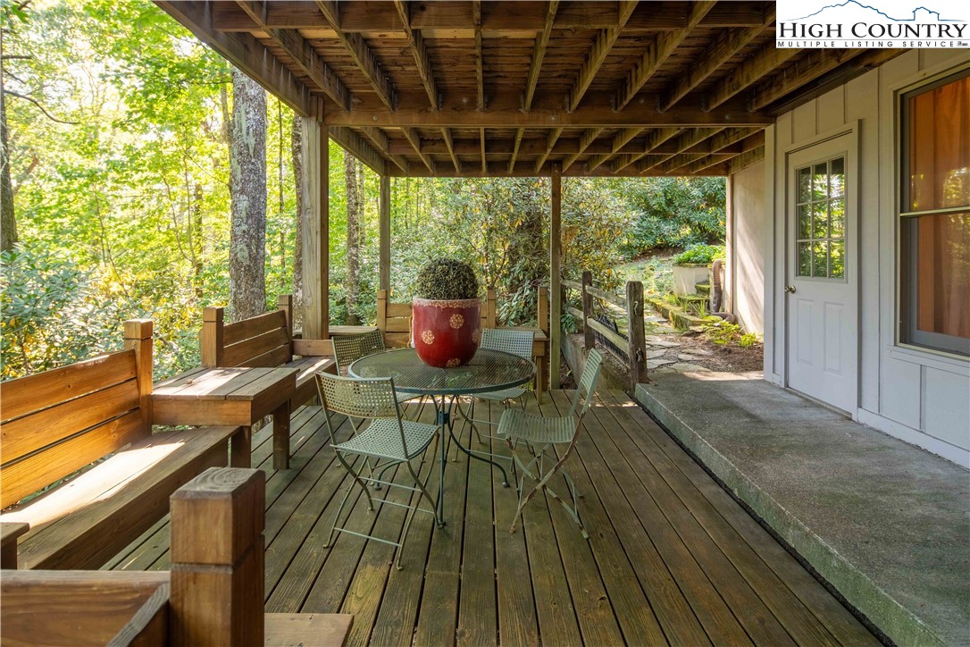 271 Pinnacle Avenue Blowing Rock, NC 28605 - Photo 39 of 43 a outdoor space with wooden floor and outdoor seating