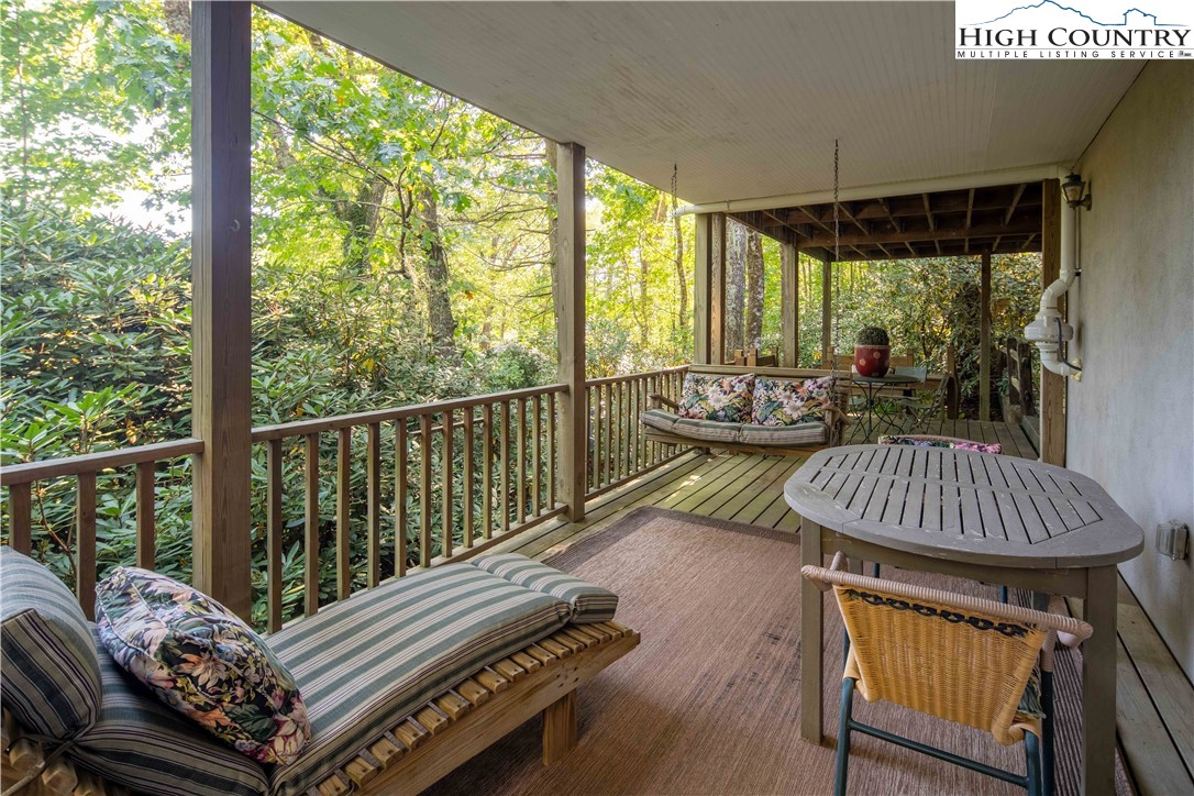 271 Pinnacle Avenue Blowing Rock, NC 28605 - Photo 40 of 43 a view of a two chairs in the deck