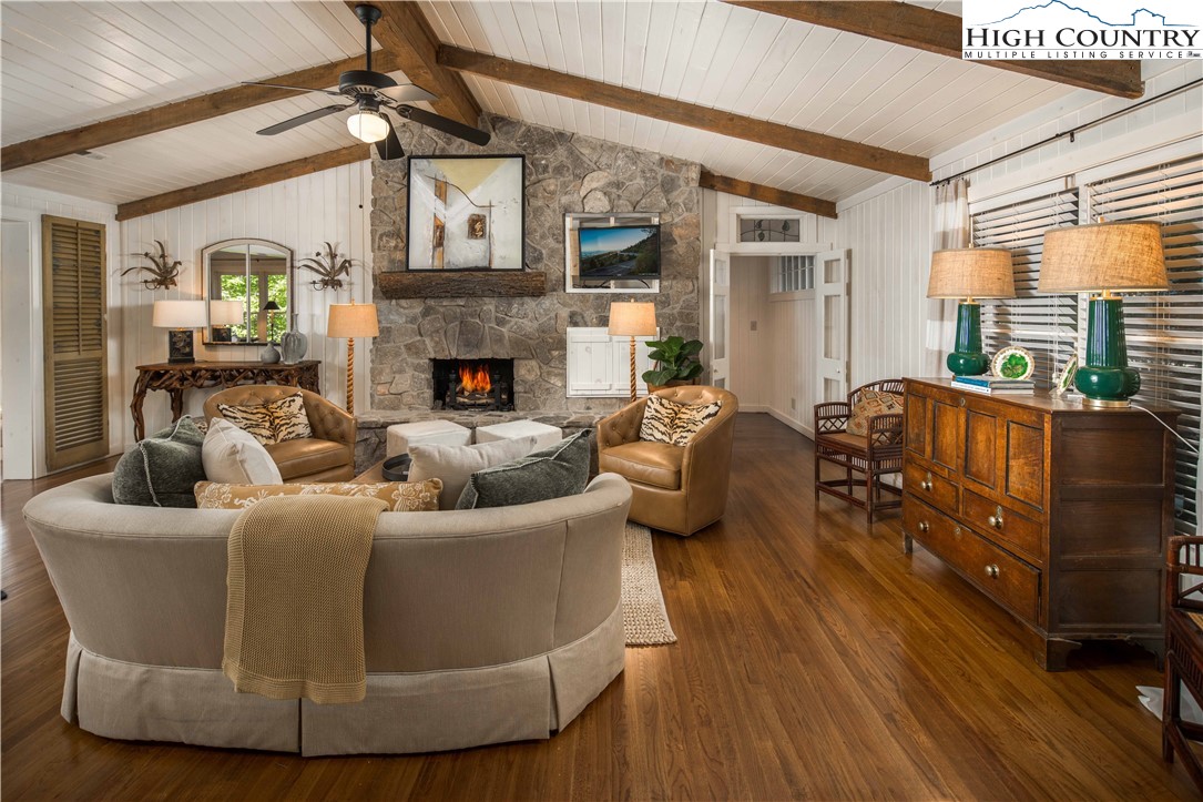 271 Pinnacle Avenue Blowing Rock, NC 28605 - Photo 5 of 43 a living room with fireplace furniture and a large window