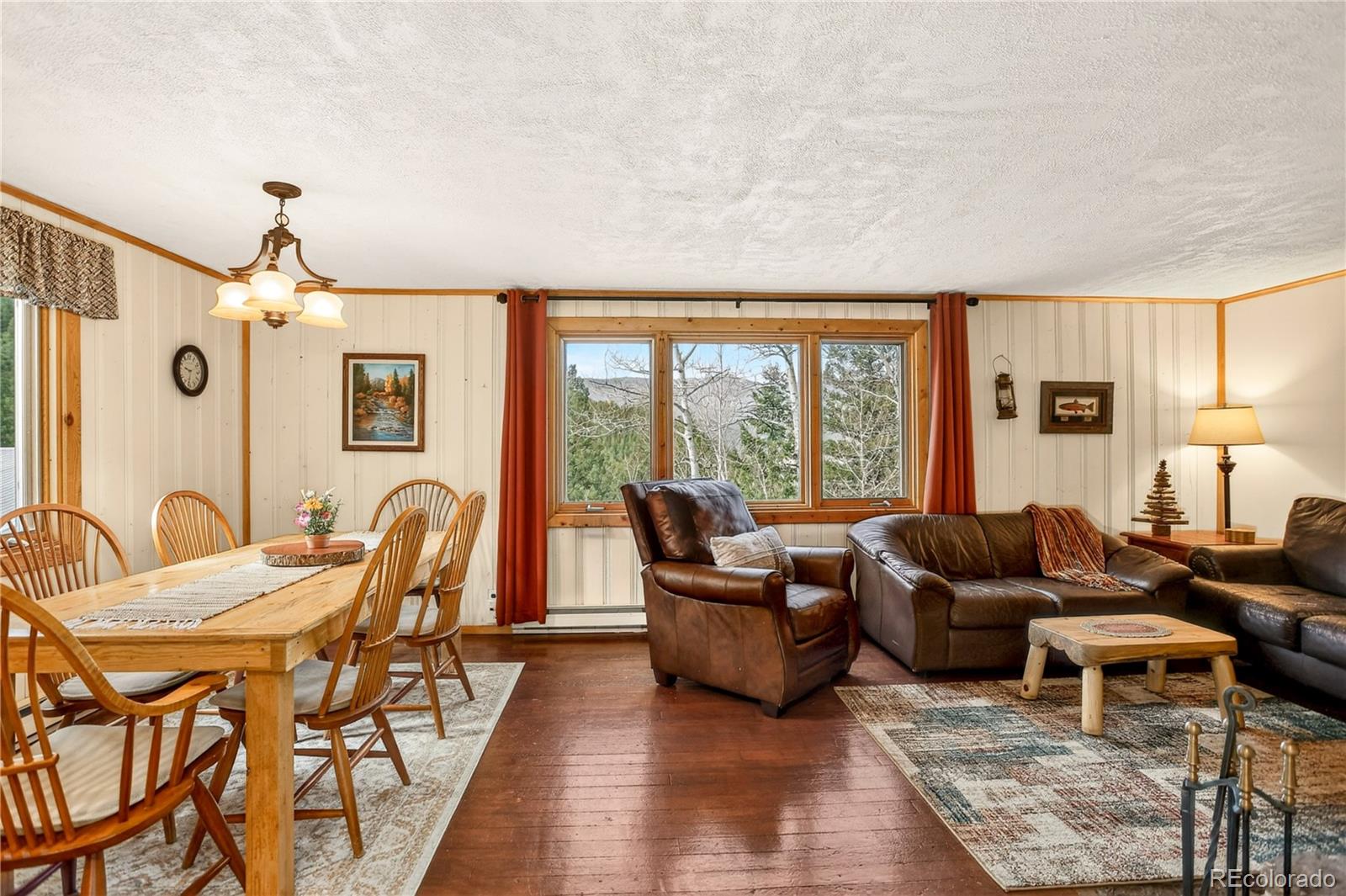626 Aspen Lane Bailey, CO 80421 - Photo 11 of 47 a living room with furniture and a large window