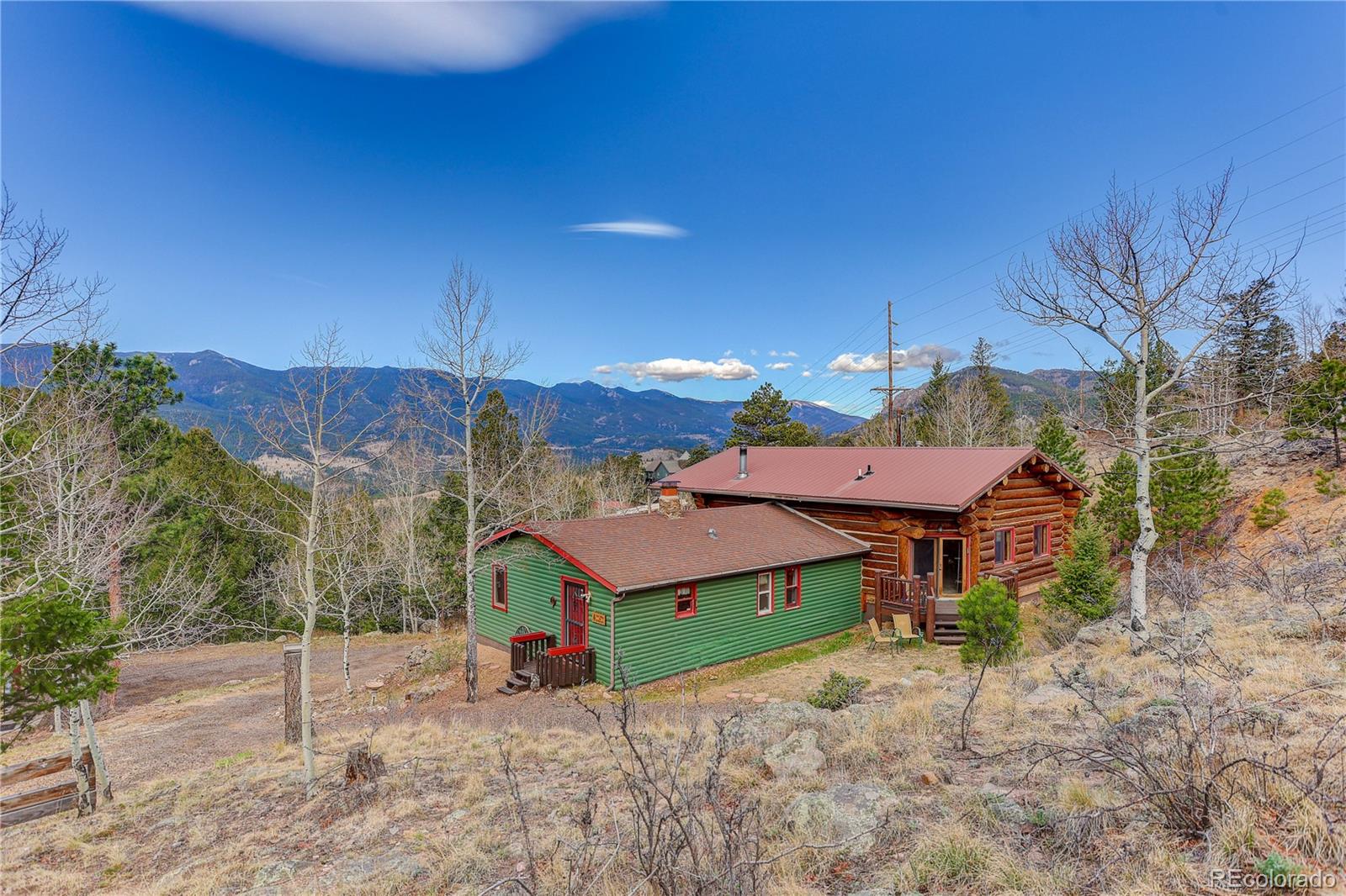 626 Aspen Lane Bailey, CO 80421 - Photo 2 of 47 a view of a house with a yard and table