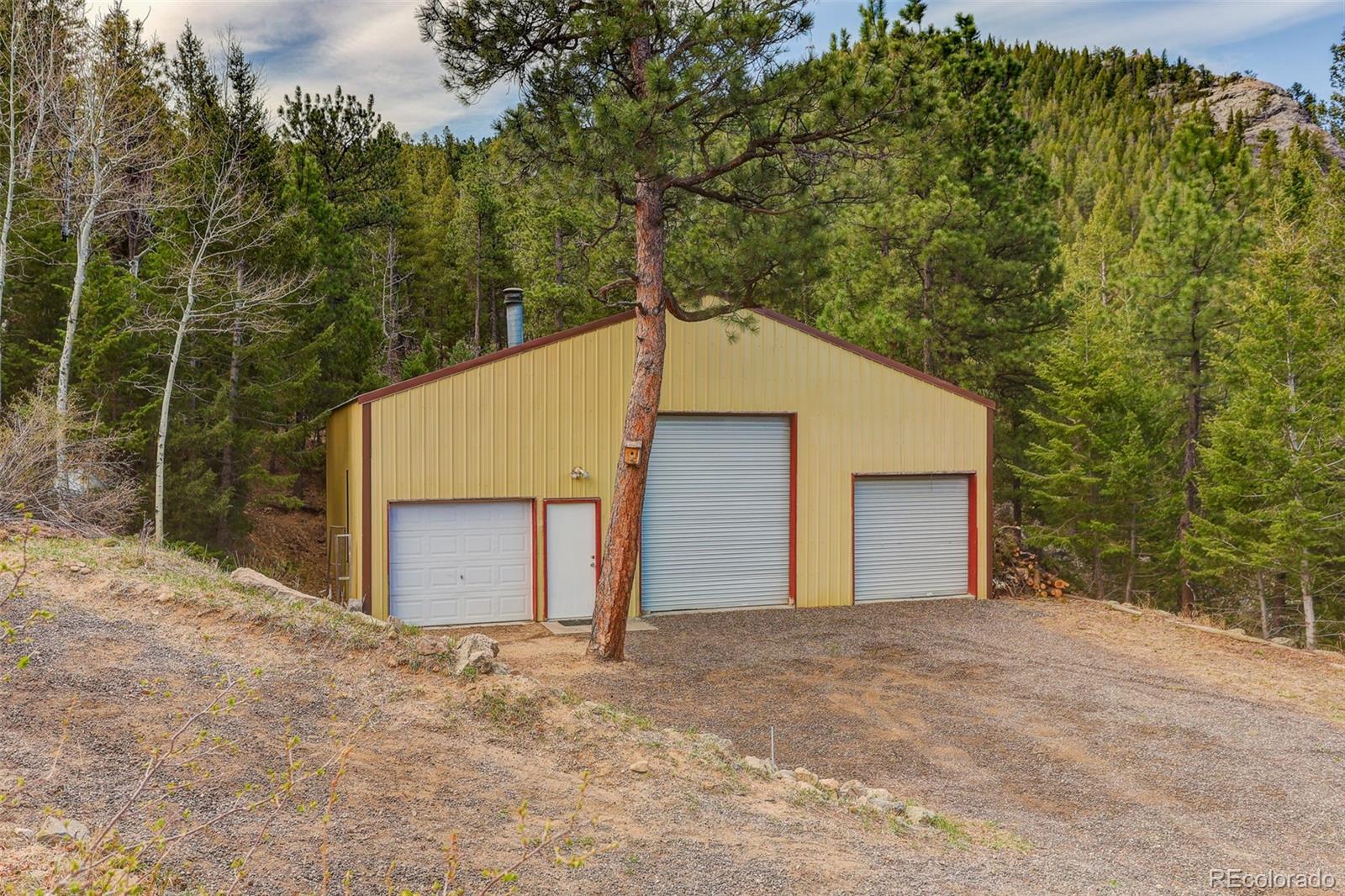 626 Aspen Lane Bailey, CO 80421 - Photo 39 of 47 a view of a garage
