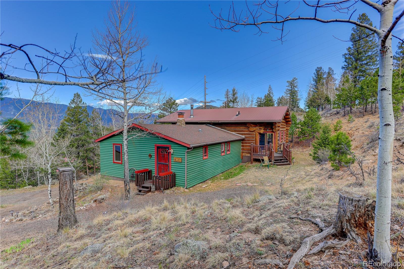 626 Aspen Lane Bailey, CO 80421 - Photo 4 of 47 an aerial view of a house with a yard