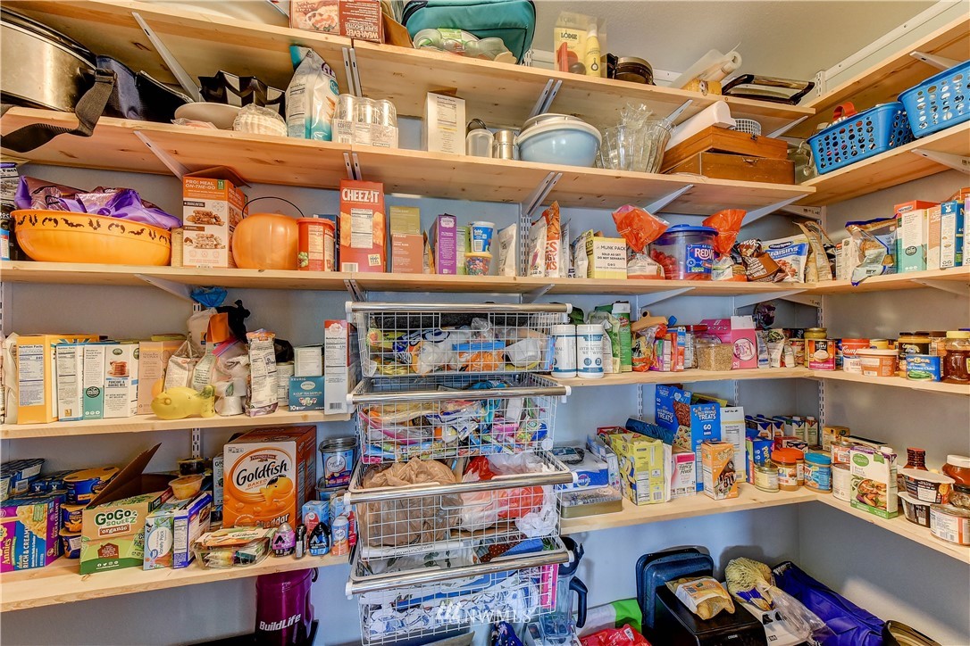 14155 Corbridge Road Southeast Monroe, WA 98272 - Photo 12 of 31 a store room with lots of different kinds of food