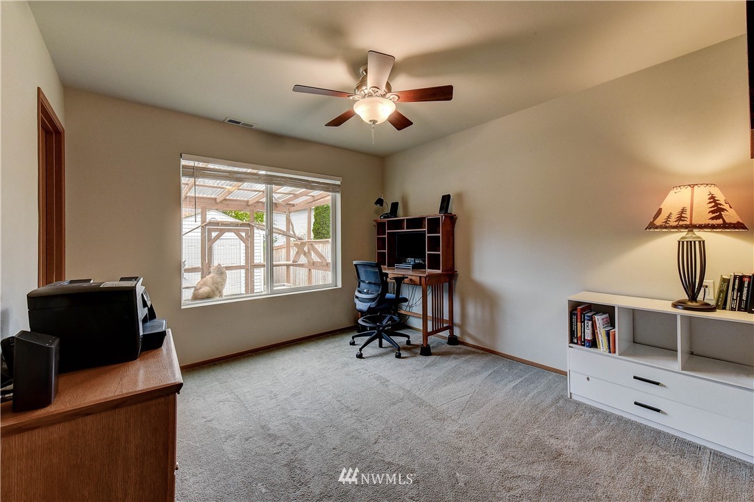 14155 Corbridge Road Southeast Monroe, WA 98272 - Photo 13 of 31 a livingroom with workspace and a window
