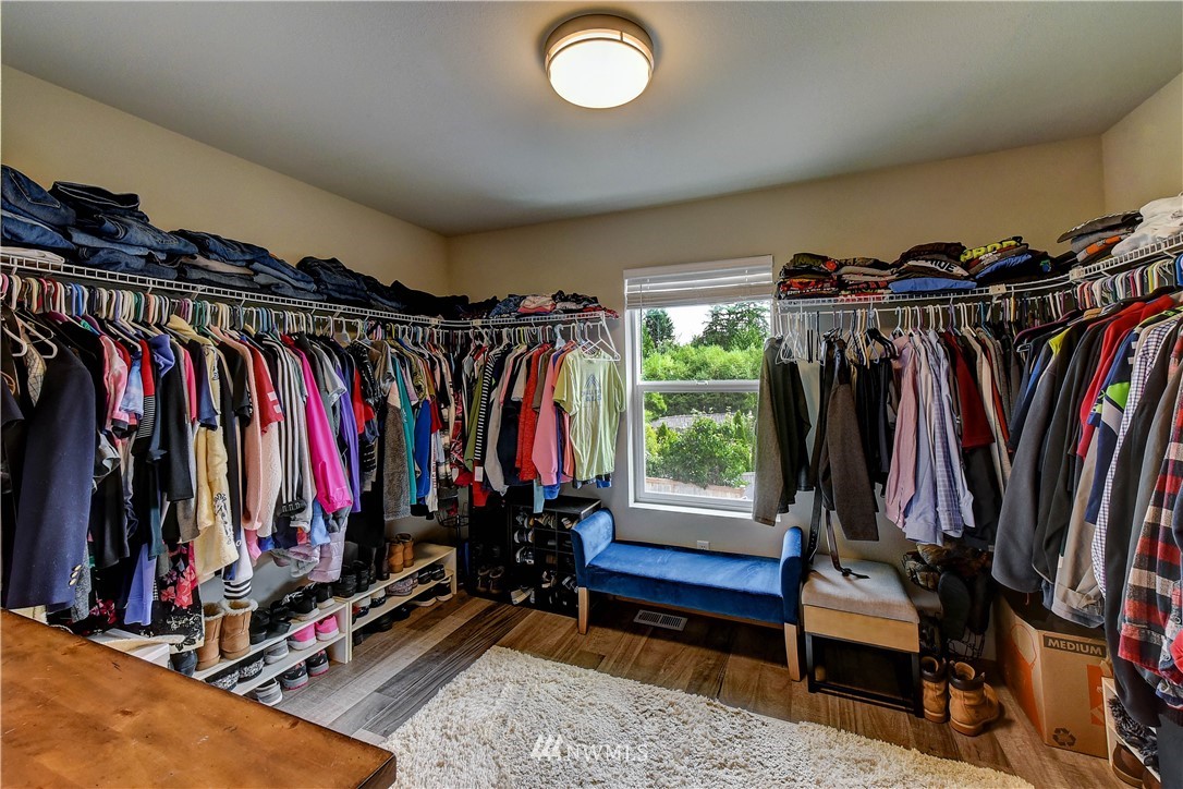14155 Corbridge Road Southeast Monroe, WA 98272 - Photo 17 of 31 a view of walk in closet with clothes