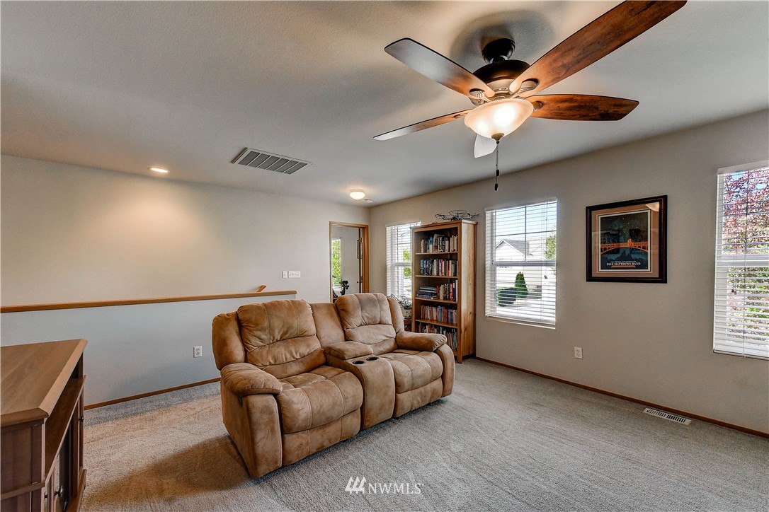 14155 Corbridge Road Southeast Monroe, WA 98272 - Photo 26 of 31 a living room with furniture and a window
