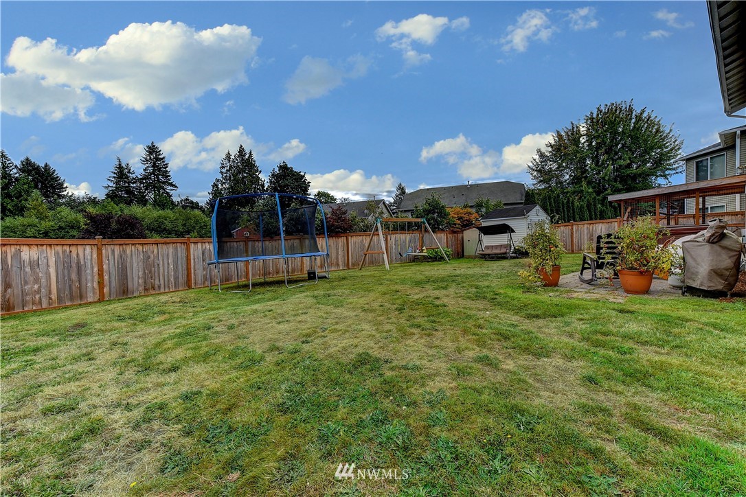 14155 Corbridge Road Southeast Monroe, WA 98272 - Photo 28 of 31 a view of a backyard with sitting area
