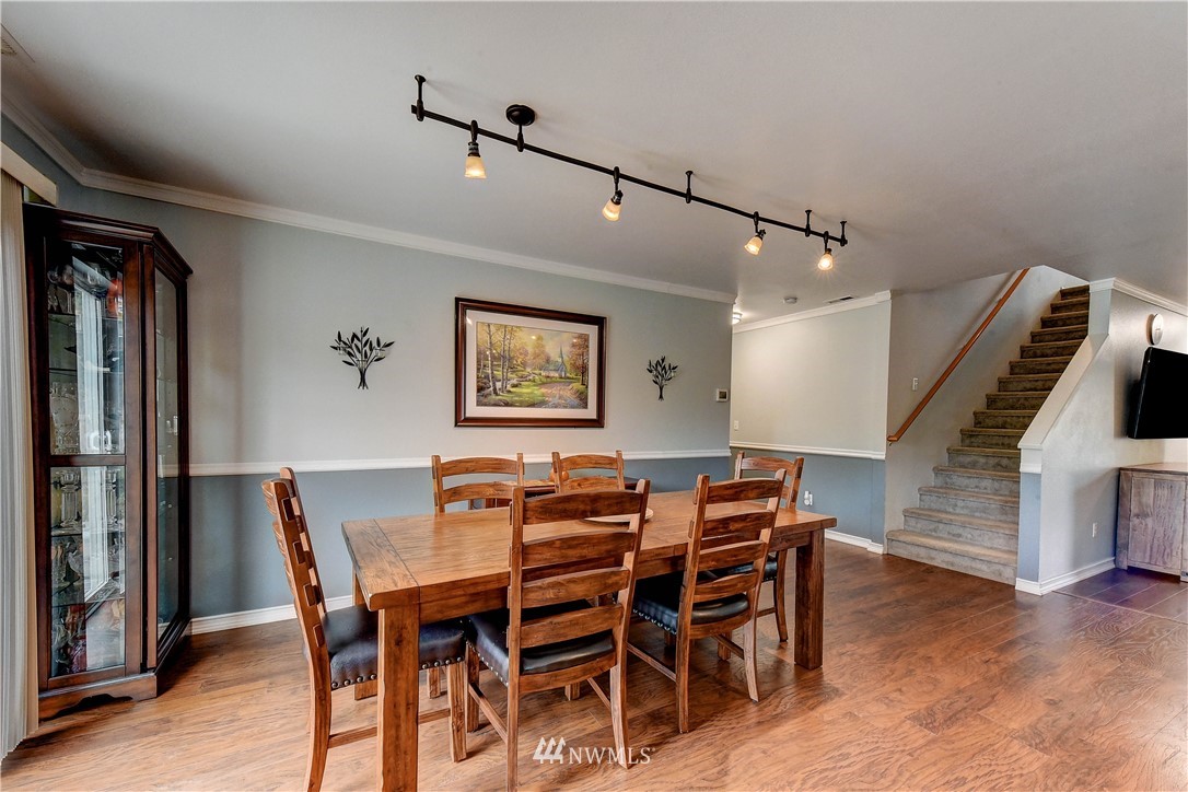 14155 Corbridge Road Southeast Monroe, WA 98272 - Photo 7 of 31 a view of a dining room with furniture