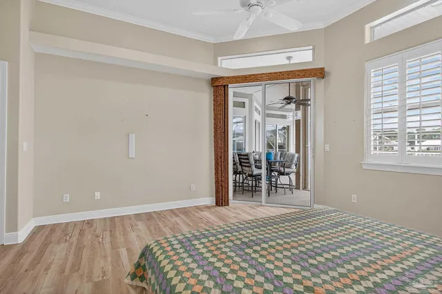an aerial view of multiple houses with yard