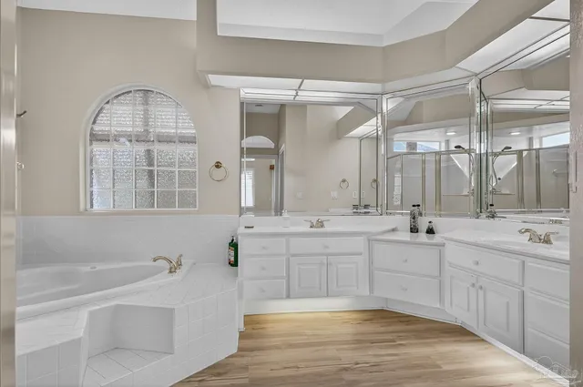 an aerial view of residential house with outdoor space and swimming pool