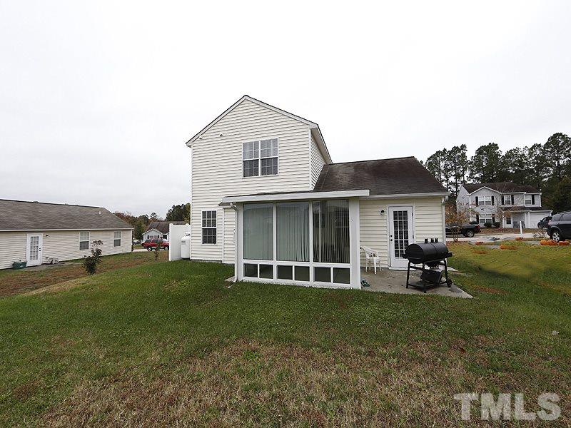 3808 Watkins Ridge Court Raleigh, NC 27616 - Photo 22 of 22 a view of a house with a yard