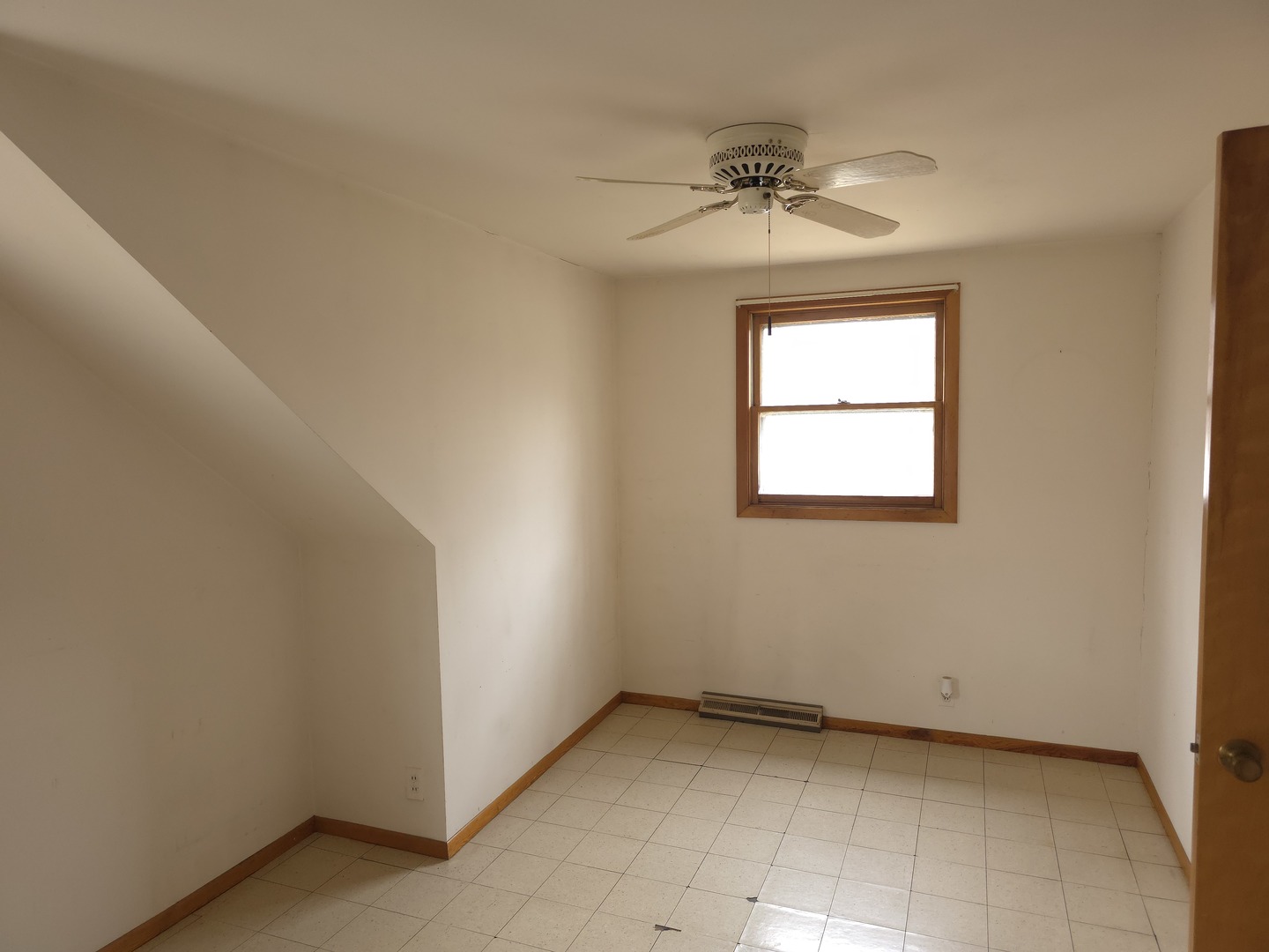 1021 173rd Street Hazel Crest, IL 60429 - Photo 16 of 24 a view of an empty room with a window