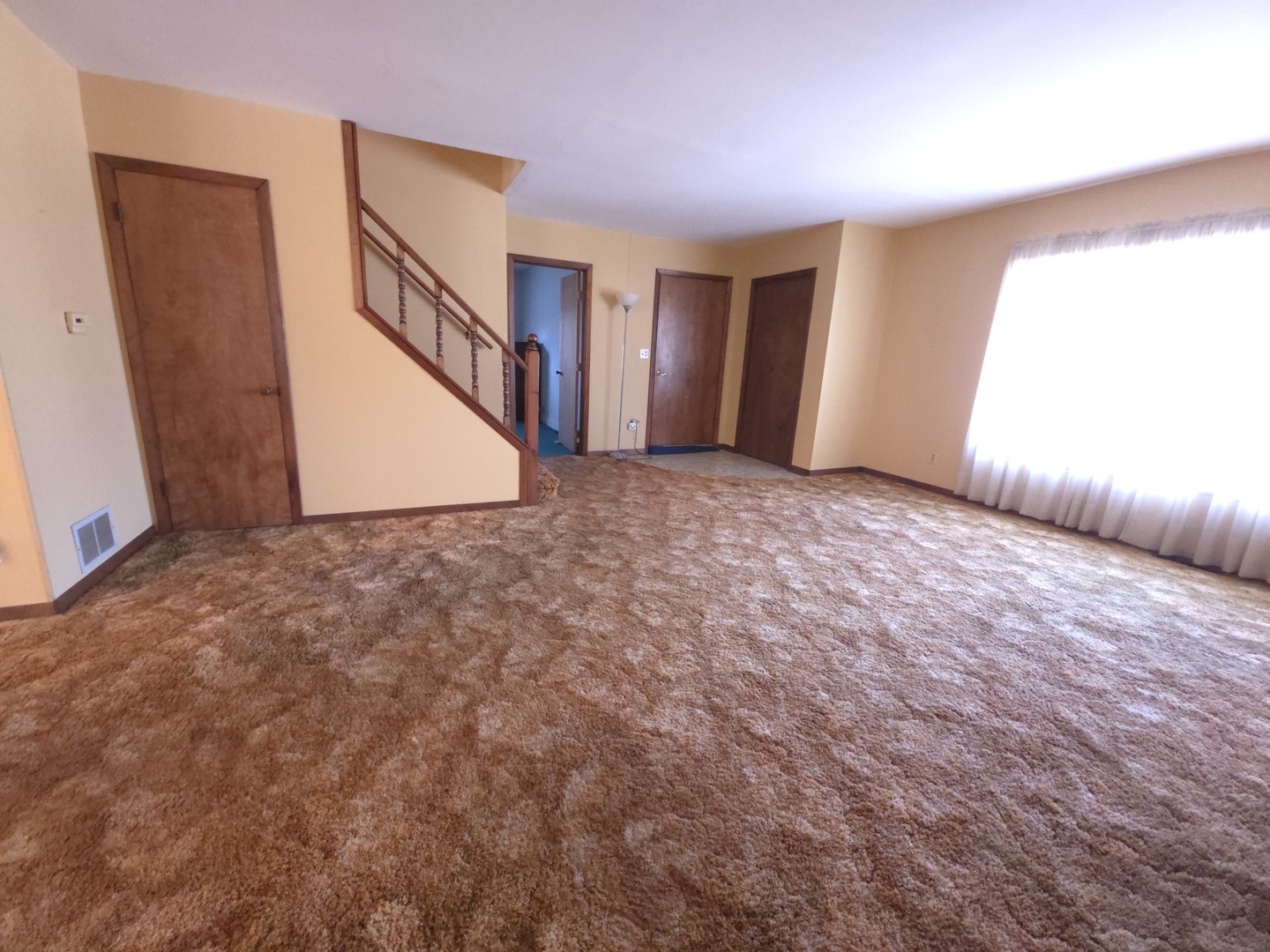 1021 173rd Street Hazel Crest, IL 60429 - Photo 10 of 24 a view of an empty room with wooden floor