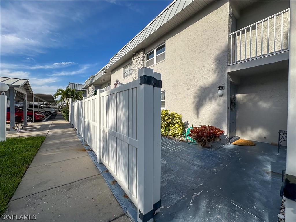 6777 Winkler Road, Unit 168 Fort Myers, FL 33919 - Photo 2 of 37 a view of a porch