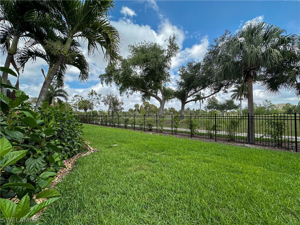 6777 Winkler Road, Unit 168 Fort Myers, FL 33919 - Photo 22 of 37 a view of garden with trees