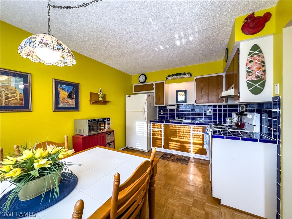 6777 Winkler Road, Unit 168 Fort Myers, FL 33919 - Photo 6 of 37 a swimming pool with window